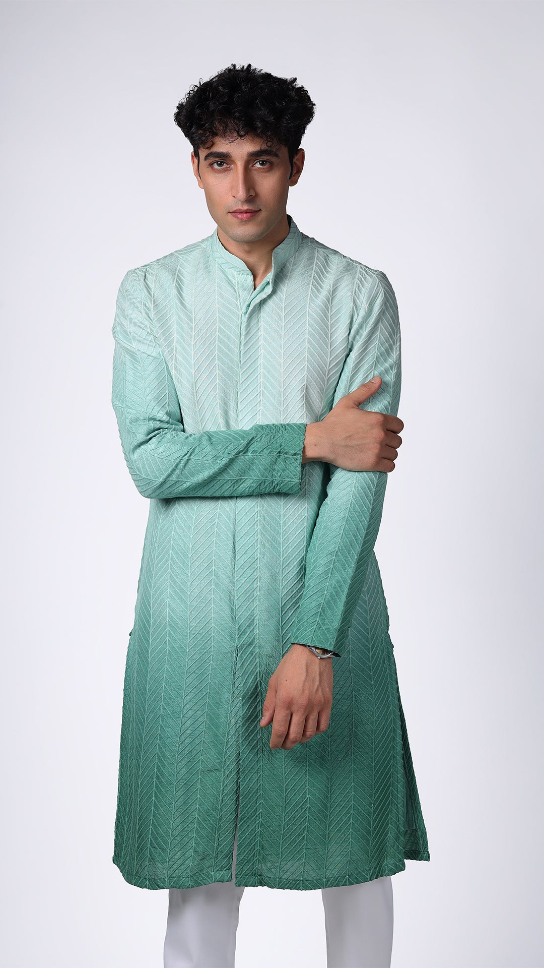 Different angle of Green Ombre Kurta with Bamboo Embroidery, featuring elegant bamboo patterns. Model in white slim trousers and tan Oxford shoes.