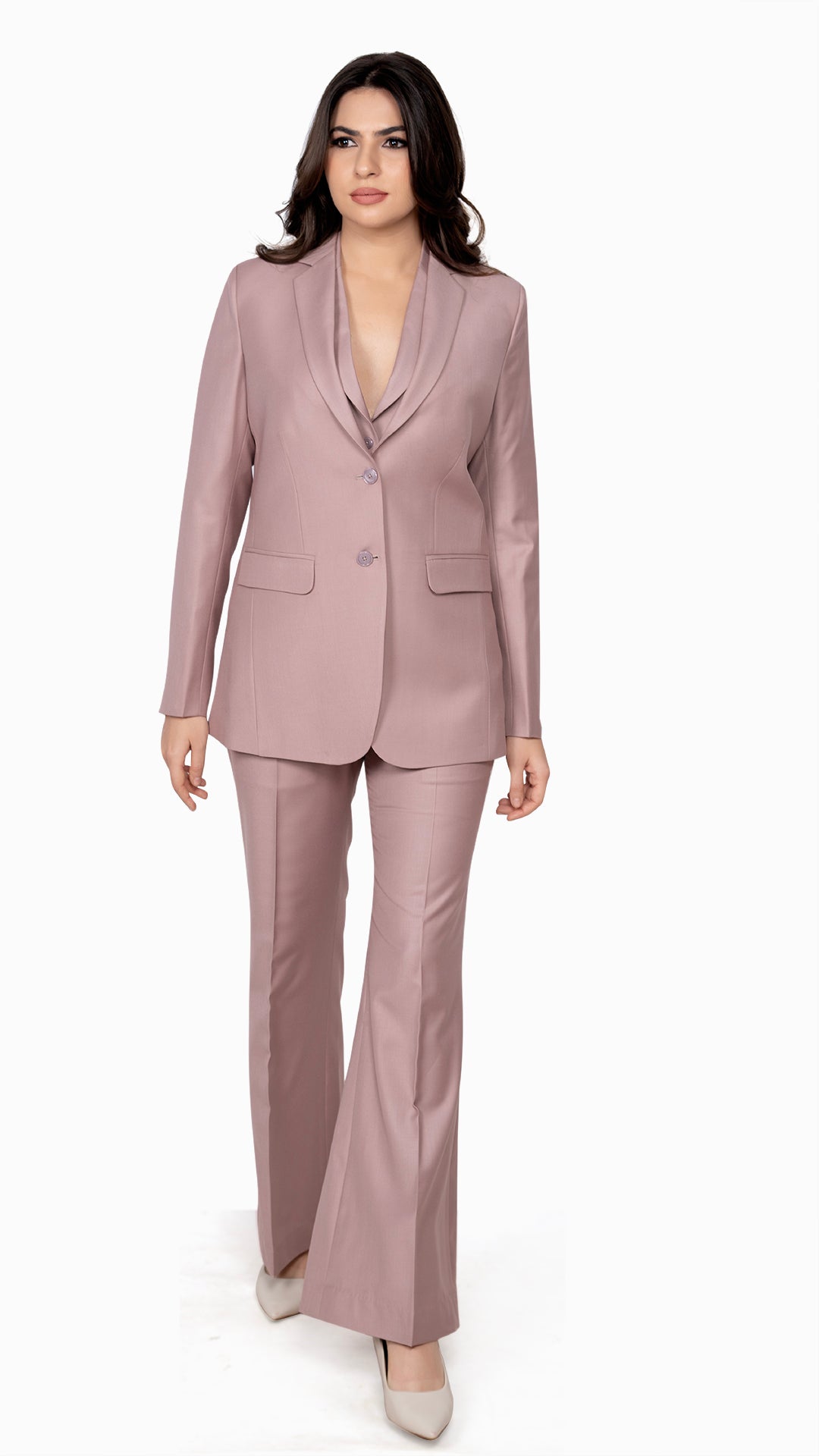 A refined onion pink blazer and bell-bottom trouser set, crafted for a strong yet feminine silhouette.