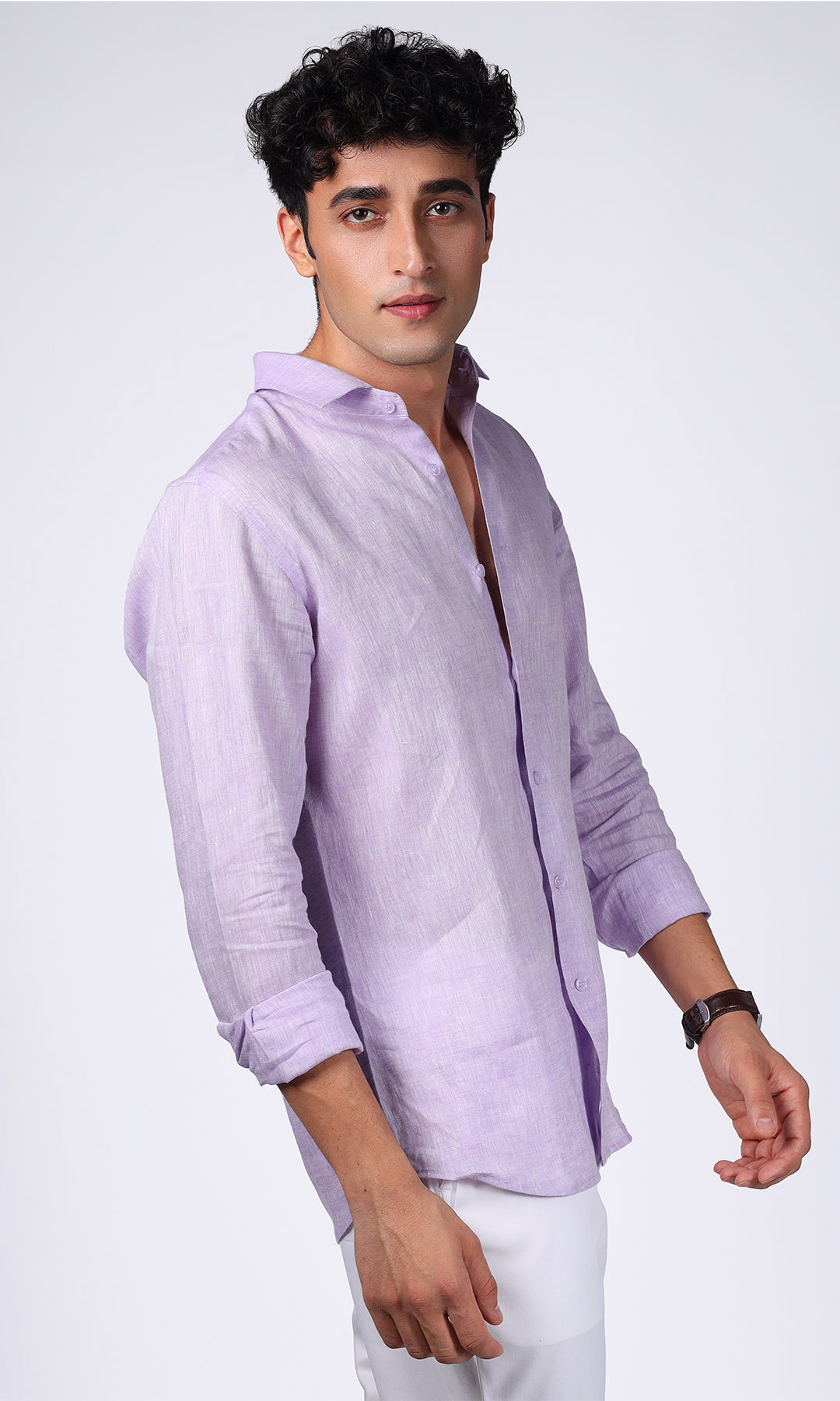 Half-length view of a model in a lavender linen shirt, highlighting a refined and stylish appearance