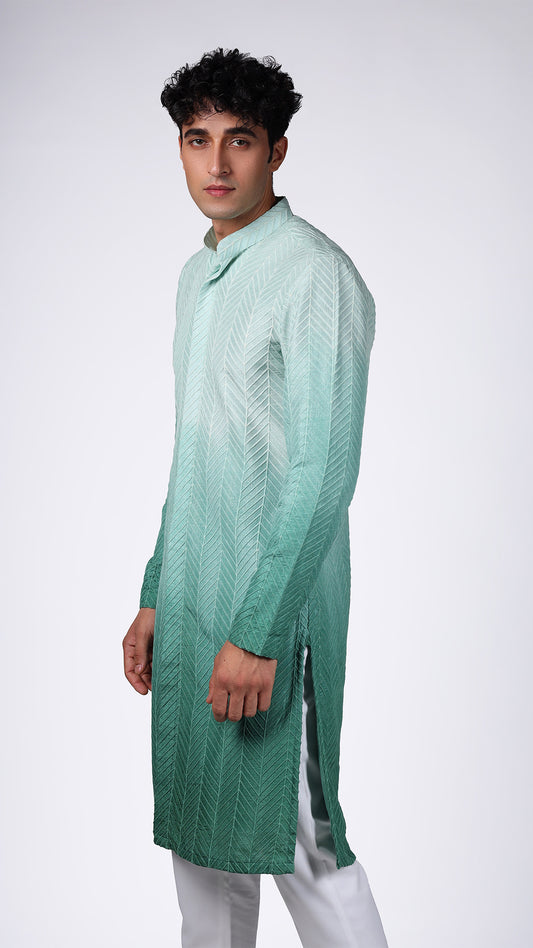 Side view of Green Ombre Kurta with Bamboo Embroidery, styled with white slim trousers and tan Oxford shoes.