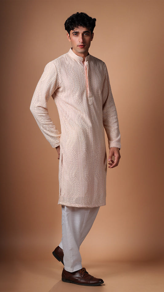 Side view of Peach Kurta with Dense Sequin and Mirror Patterns, worn with salwar and tan Oxford shoes