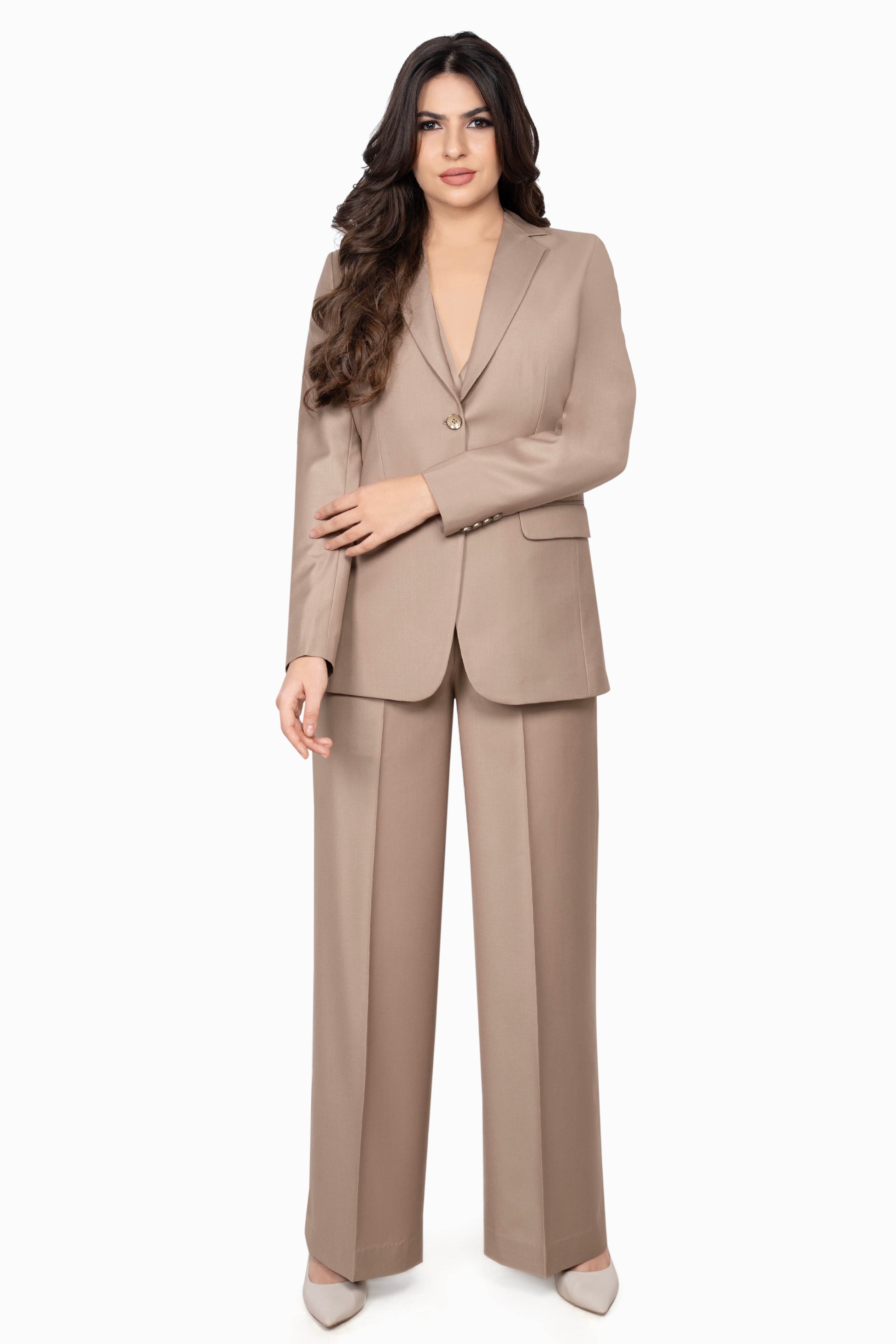A structured yet refined three-piece suit in beige, including a sleek blazer, double-breasted waistcoat, and classic trousers. Perfect for business meetings and formal occasions.