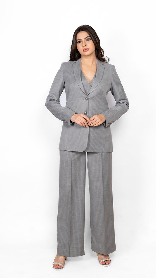 An impeccably tailored three-piece suit featuring a single-breasted blazer, 6-button double-breasted waistcoat, and straight-fit trousers. The ultimate power suit.