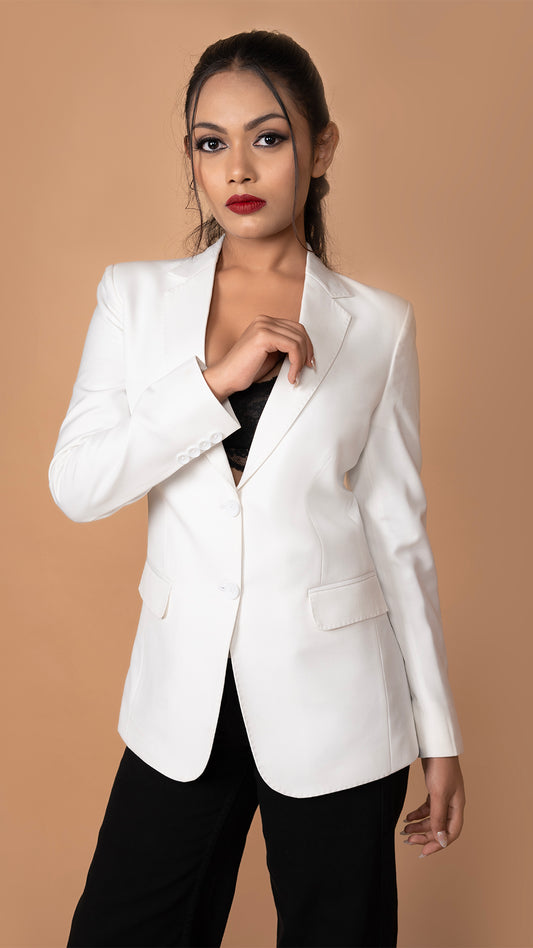 A structured white blazer featuring a refined notch lapel with peak stitching, tailored for a sharp and modern silhouette