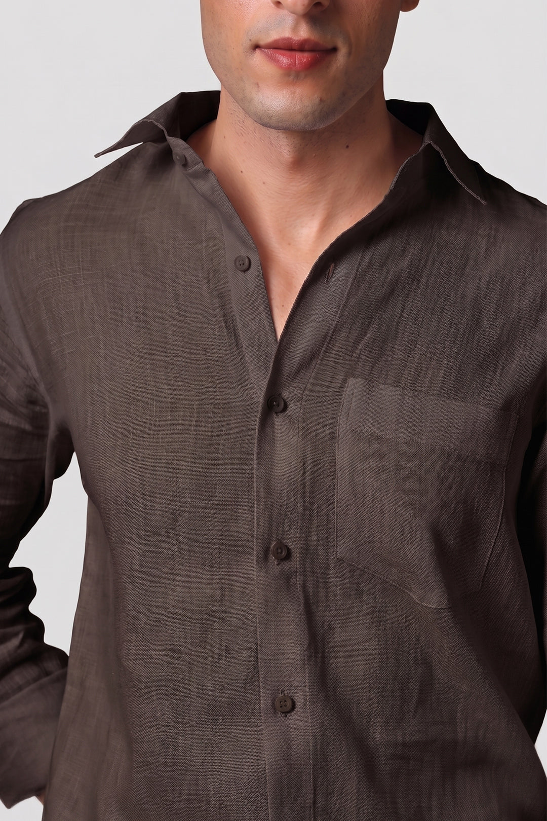 Bison Brown pure linen shirt for men, close-up of spread collar, button placket, and chest pocket showing end-on-end linen texture, by BWO