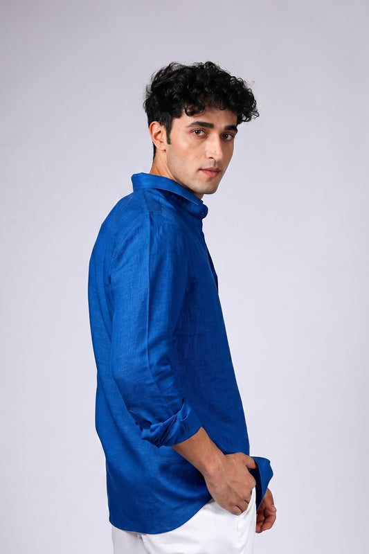 Cobalt blue linen shirt for men - side back view showing clean cut and sleeve roll - BWO bespoke linen shirt