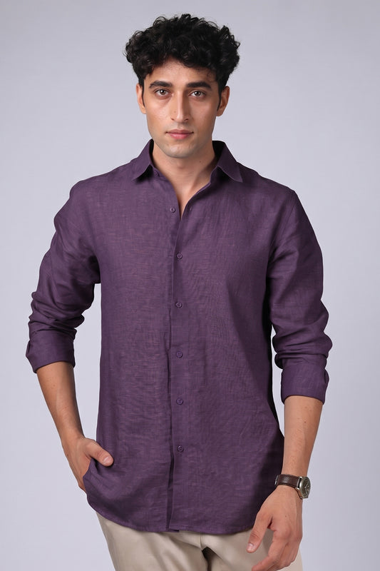 Deep plum pure linen shirt for men, full front view, spread collar, long sleeves, rounded hem, styled with beige trousers, by BWO