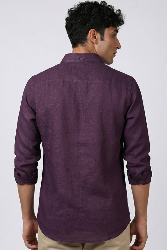 Deep plum pure linen shirt for men, back view, showing yoke detail and collar button, styled with beige trousers, by BWO